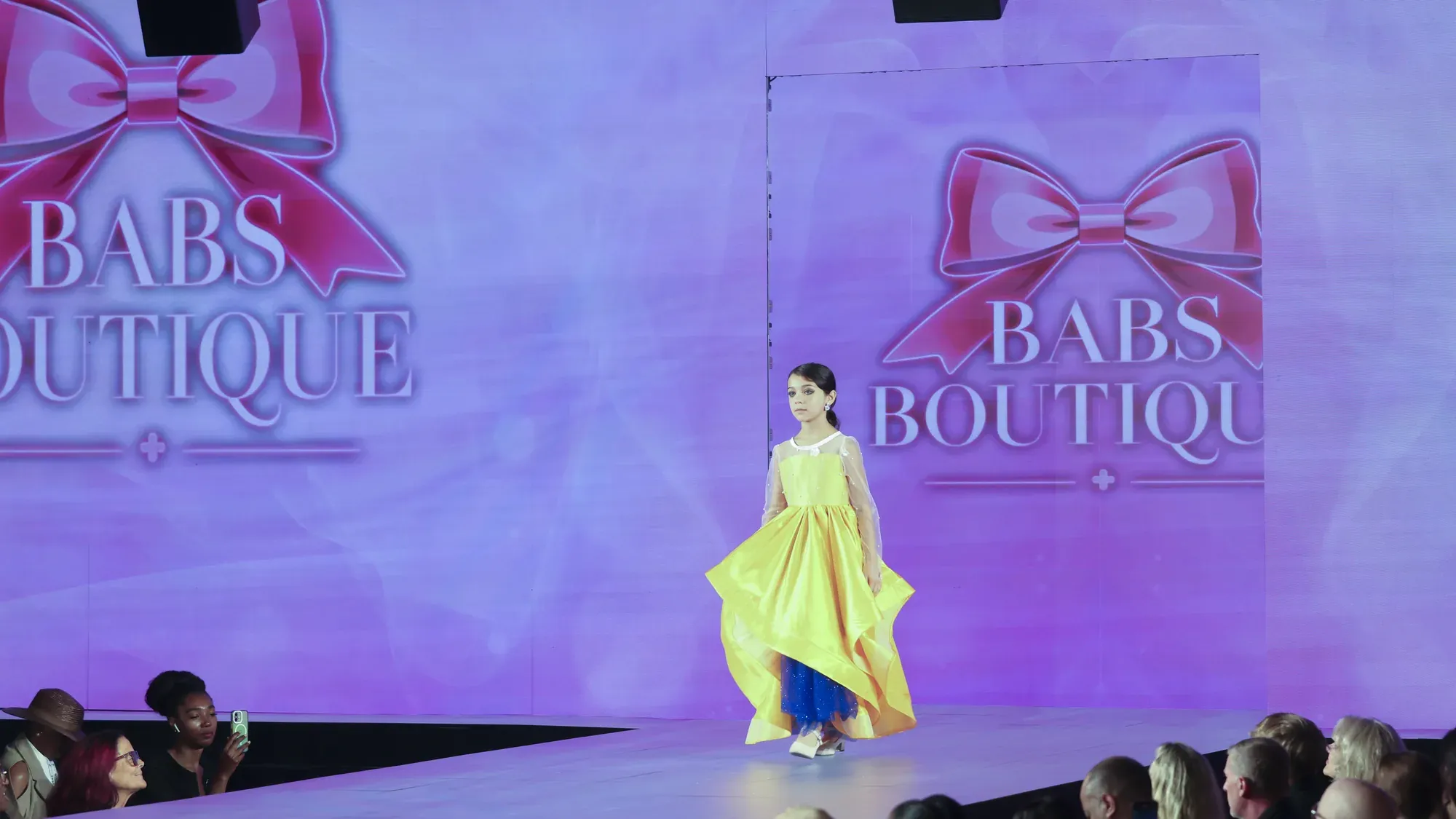 Marigold organza gown with pearl-set sleeves — Babs Boutique, Orlando Monroy Memorial Artist Collaboration Collection, New York Fashion Week