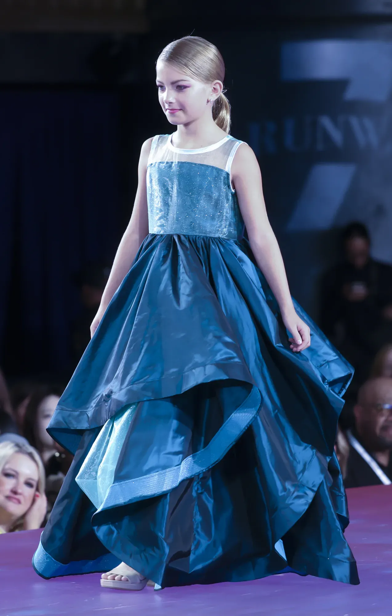 Teal tiered gown — Babs Boutique, Orlando Monroy Memorial Artist Collaboration Collection, New York Fashion Week