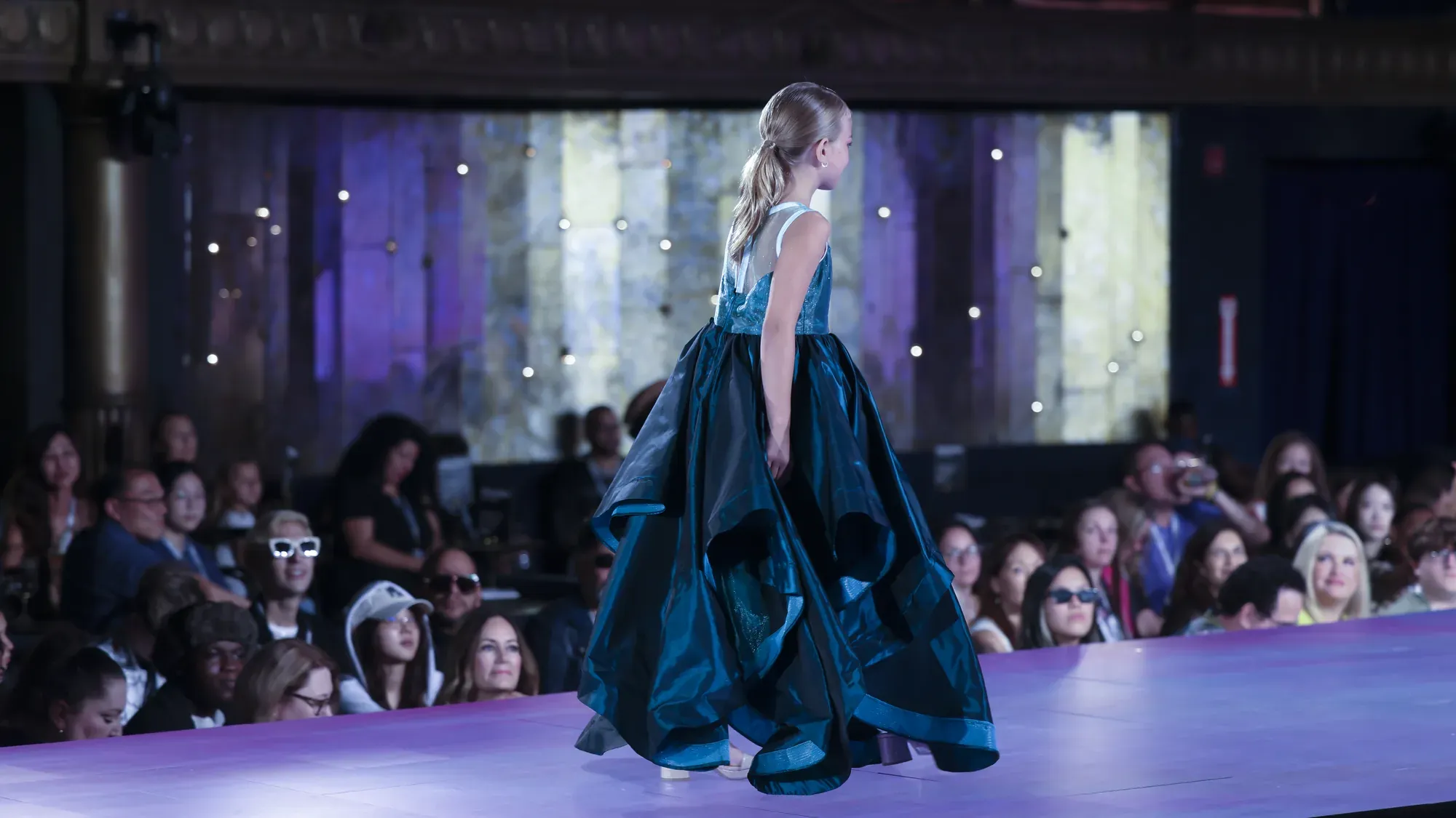 Teal tiered gown — Babs Boutique, Orlando Monroy Memorial Artist Collaboration Collection, New York Fashion Week
