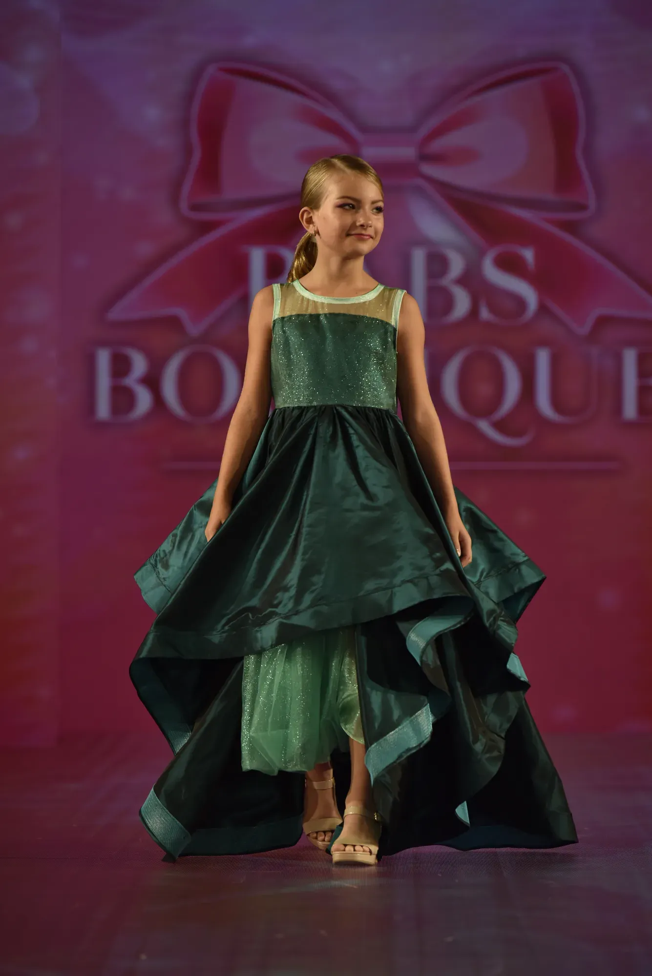 Teal tiered gown — Babs Boutique, Orlando Monroy Memorial Artist Collaboration Collection, New York Fashion Week