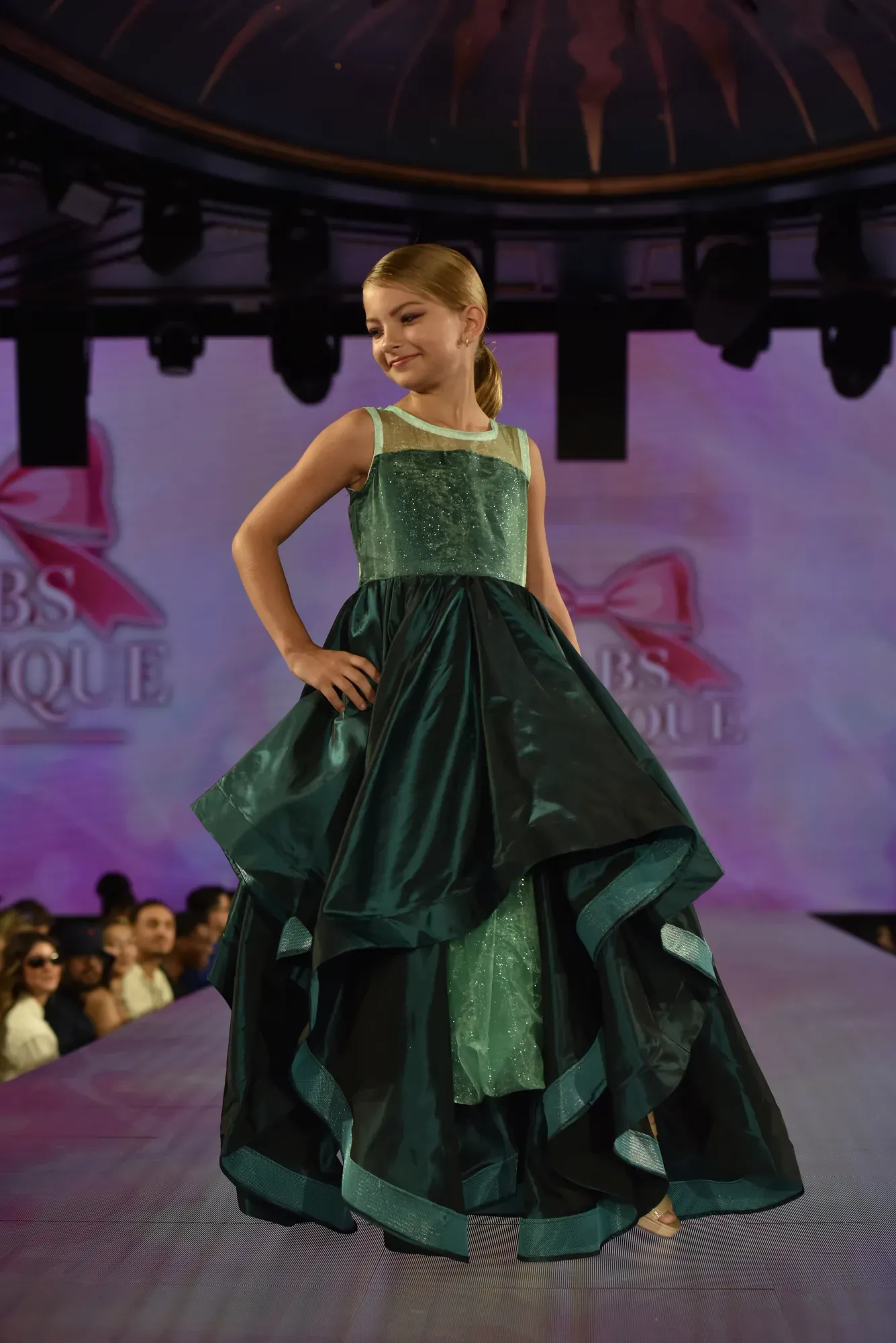 Teal tiered gown — Babs Boutique, Orlando Monroy Memorial Artist Collaboration Collection, New York Fashion Week