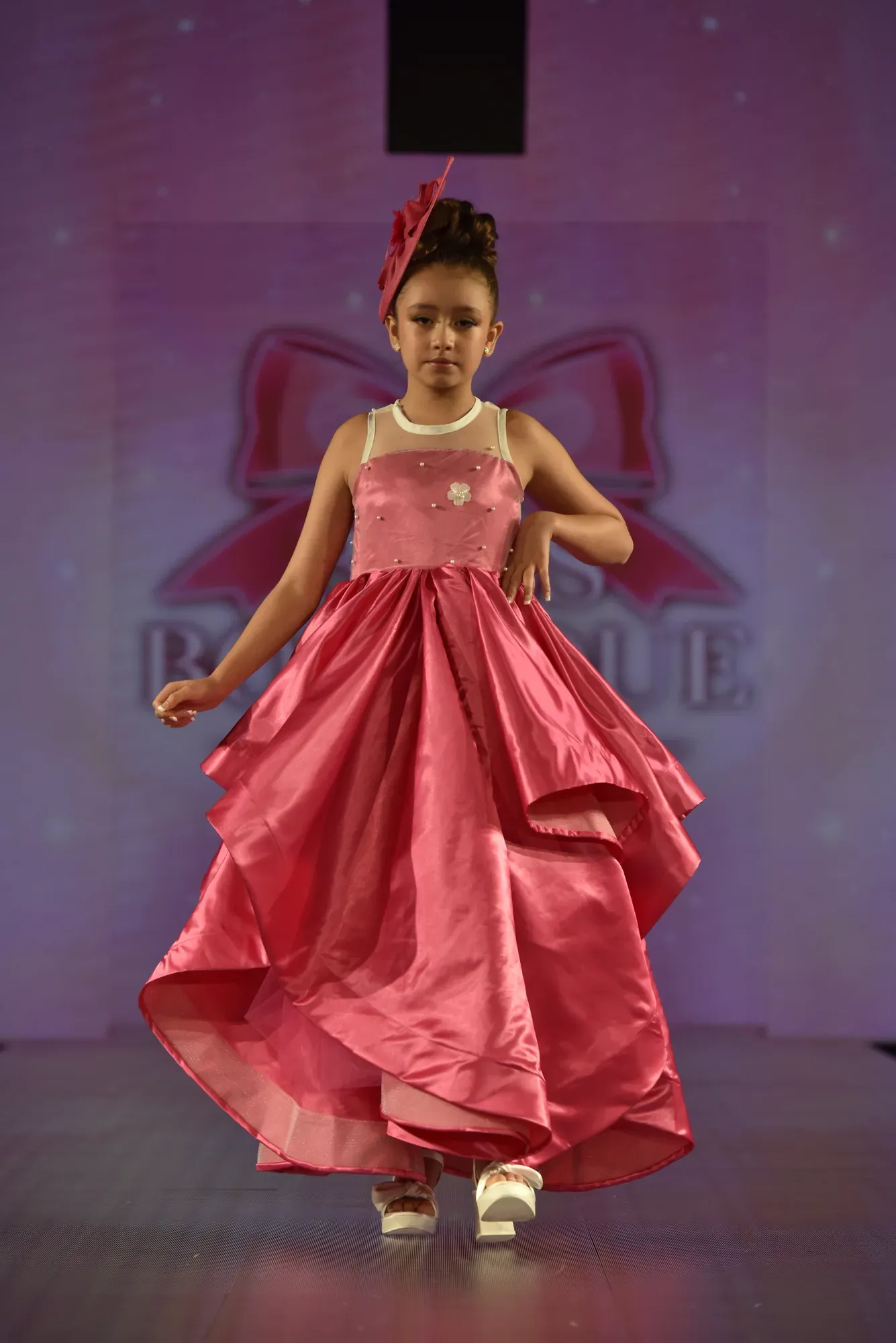 Rose satin gown — Babs Boutique, Orlando Monroy Memorial Artist Collaboration Collection, New York Fashion Week
