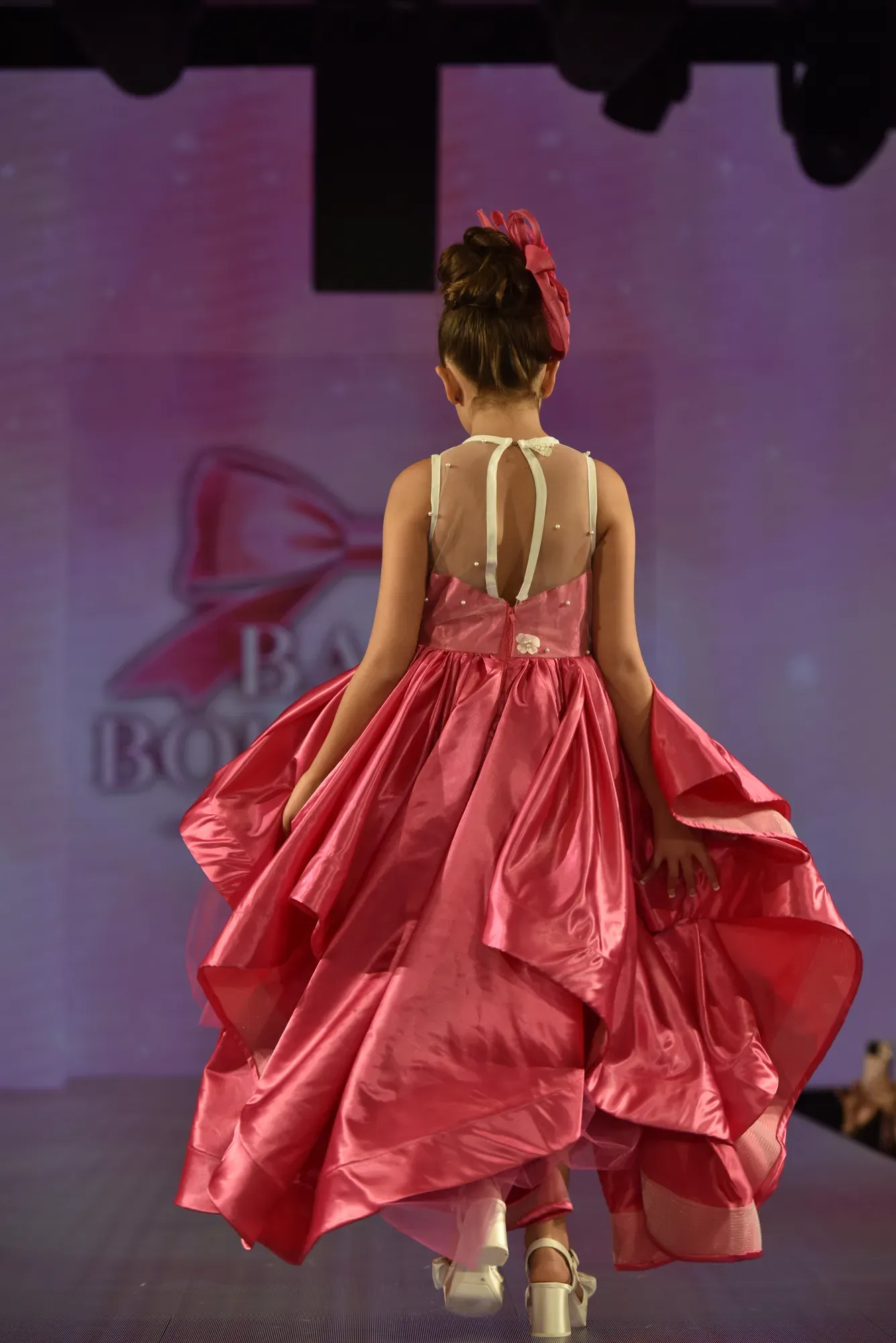 Rose satin gown — Babs Boutique, Orlando Monroy Memorial Artist Collaboration Collection, New York Fashion Week