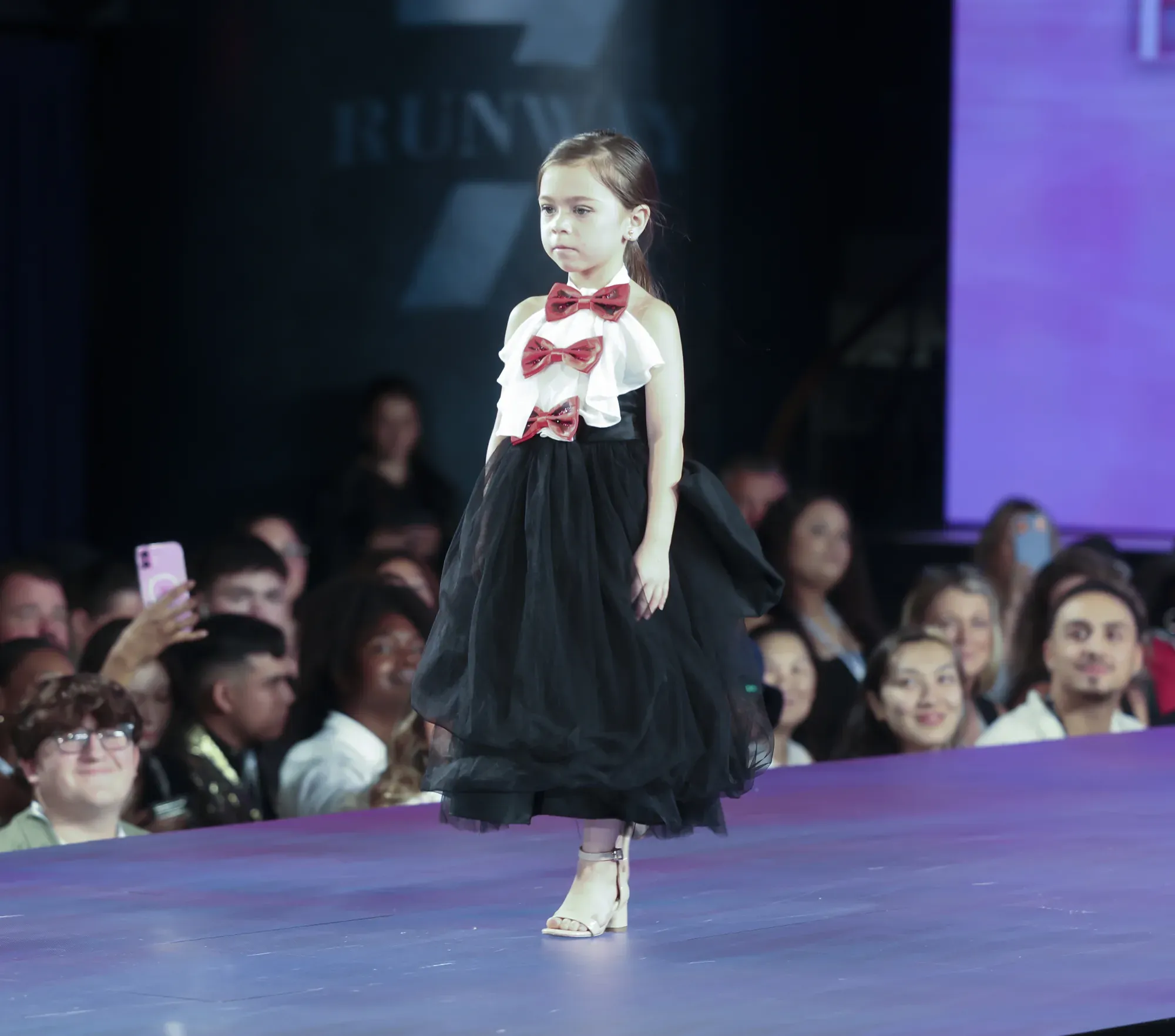 Black tulle skirt with red bow bodice — Babs Boutique, Orlando Monroy Memorial Artist Collaboration Collection, New York Fashion Week
