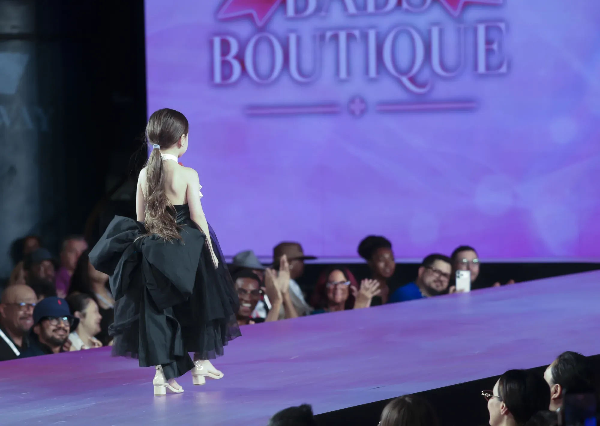Black tulle skirt with red bow bodice — Babs Boutique, Orlando Monroy Memorial Artist Collaboration Collection, New York Fashion Week