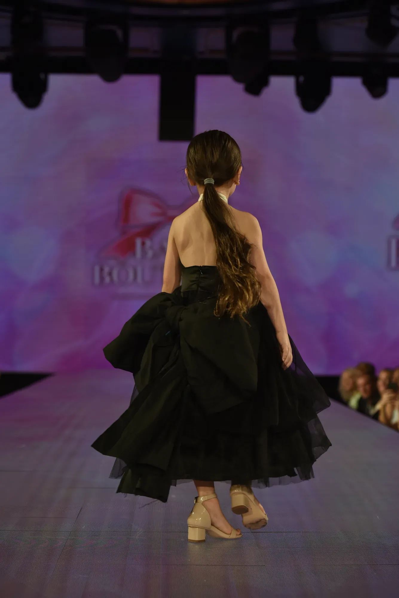 Black tulle skirt with red bow bodice — Babs Boutique, Orlando Monroy Memorial Artist Collaboration Collection, New York Fashion Week