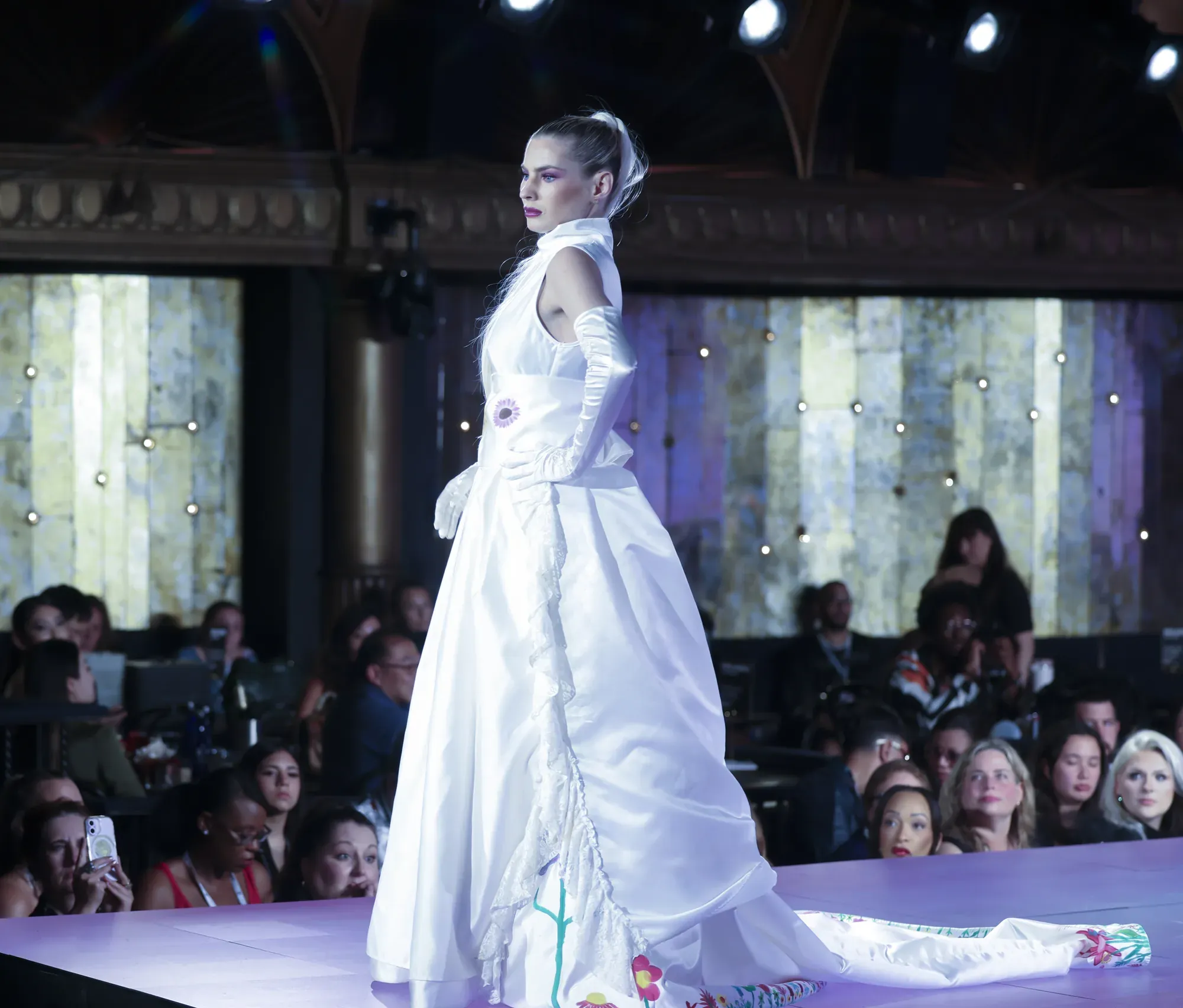Ivory gown with sunflower appliqué — Babs Boutique, Orlando Monroy Memorial Artist Collaboration Collection, New York Fashion Week