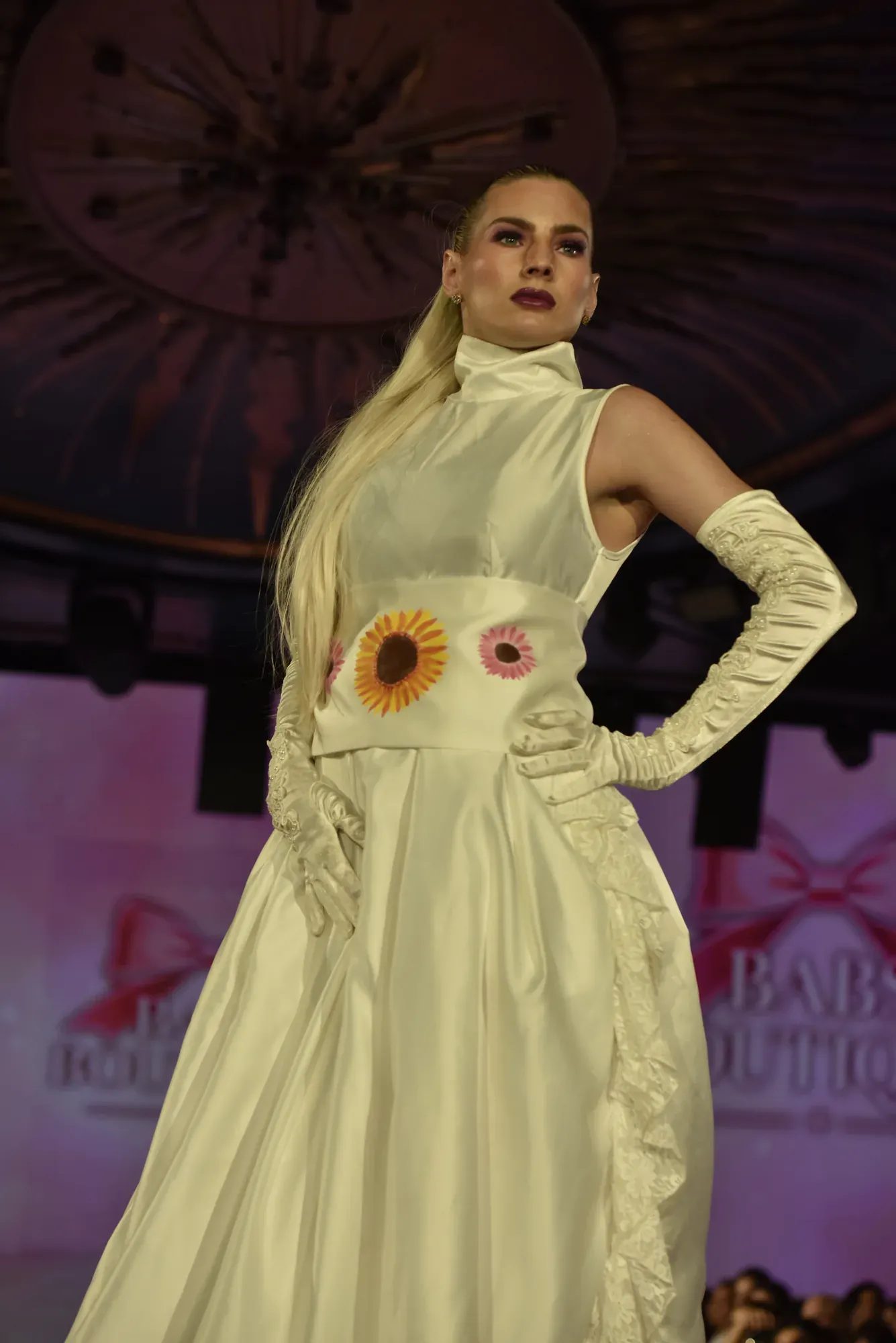 Ivory gown with sunflower appliqué — Babs Boutique, Orlando Monroy Memorial Artist Collaboration Collection, New York Fashion Week