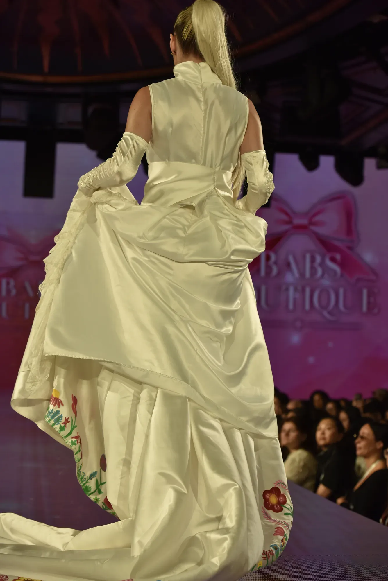 Ivory gown with sunflower appliqué — Babs Boutique, Orlando Monroy Memorial Artist Collaboration Collection, New York Fashion Week